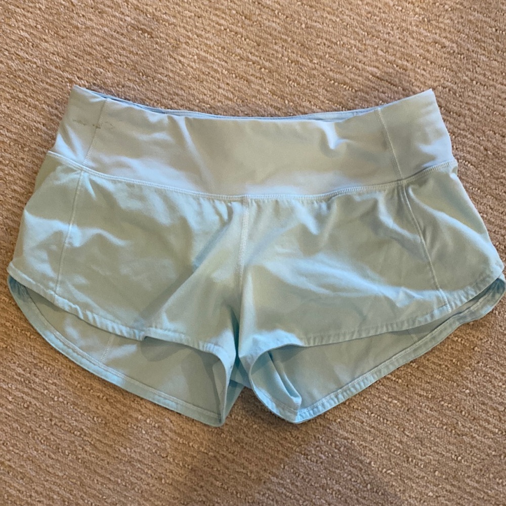 Lululemon speed up shorts size 4. Has a small spot on waist band. (See picture)